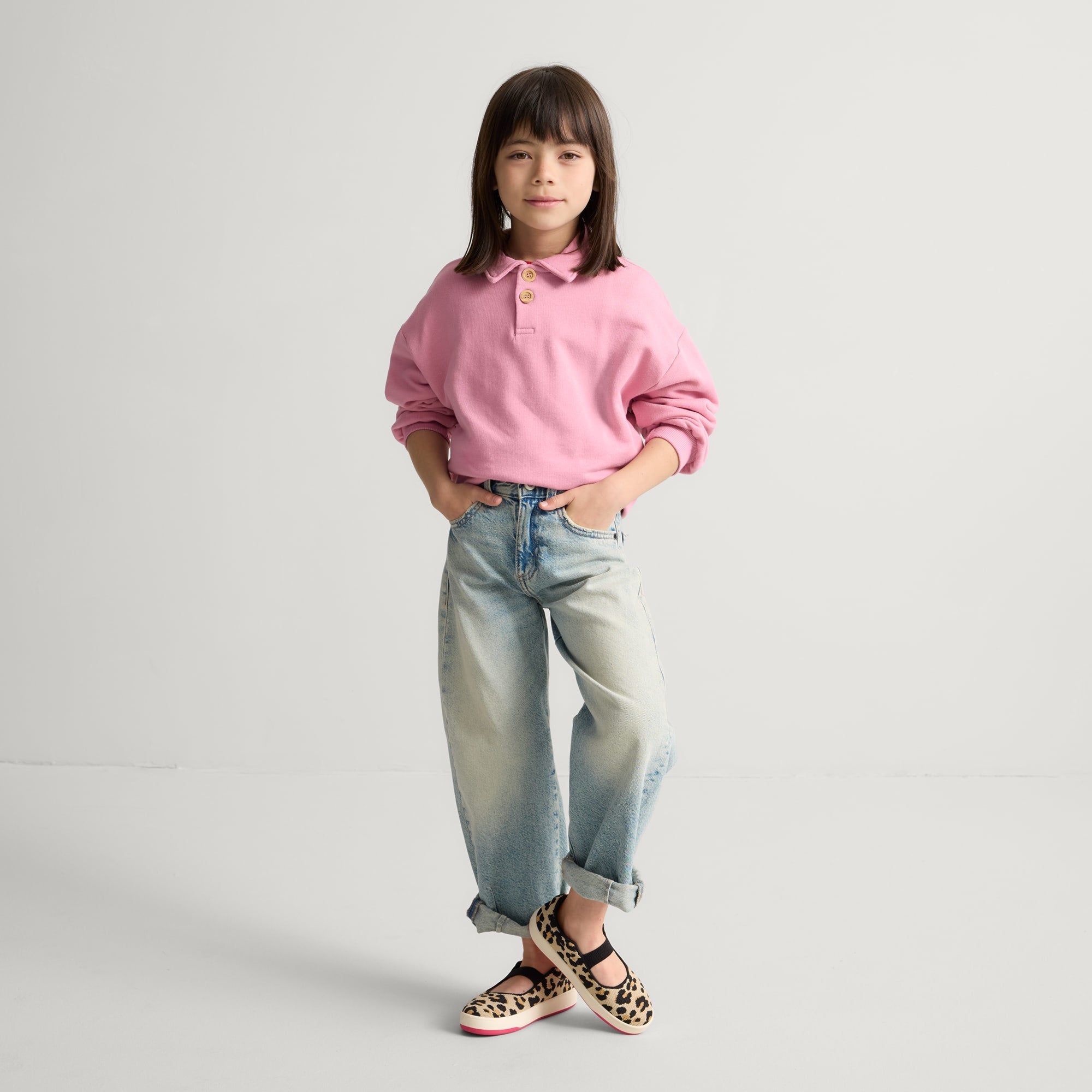 model | Alternate view of a model wearing The Kids MJ Sneaker in Desert Cat.
