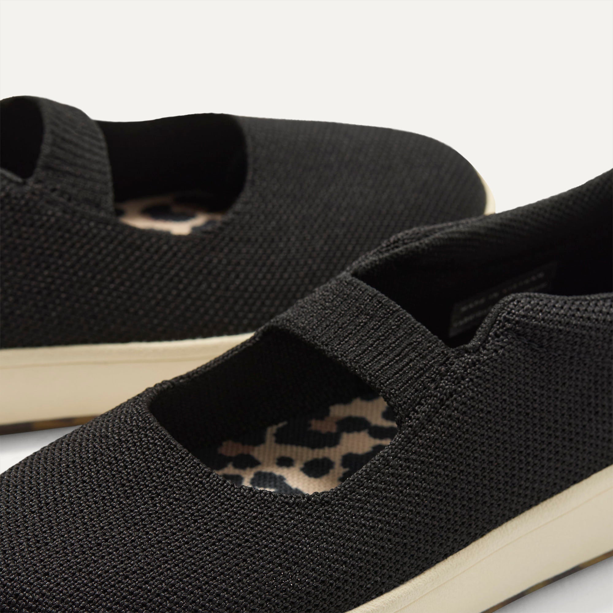 Close up of the strap  detail of The Kids MJ Sneaker in Black.