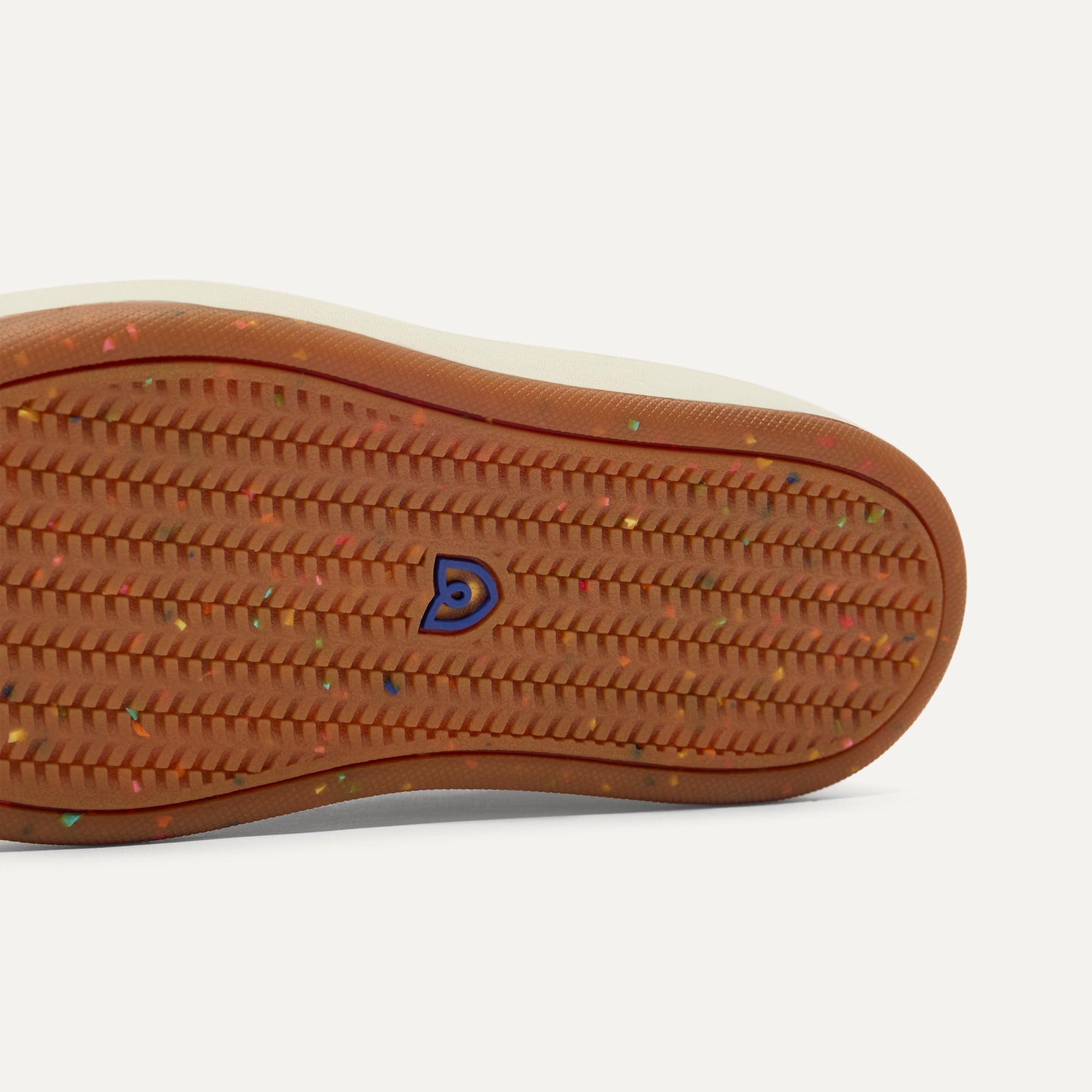 The sole of The Kids Stretch Sneaker in Firecracker.