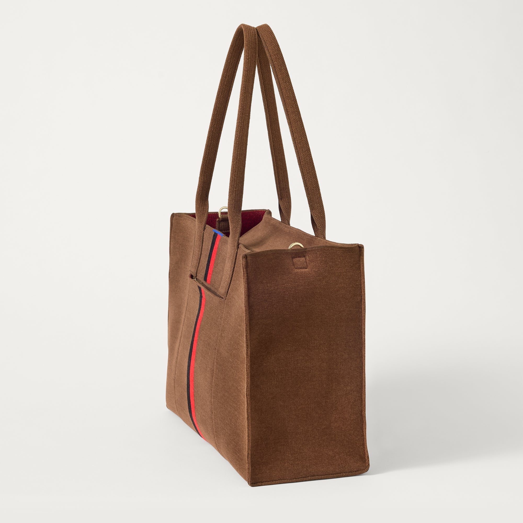 The Classic Tote in ReVelvet Cinnamon Stripe, shown from the side.