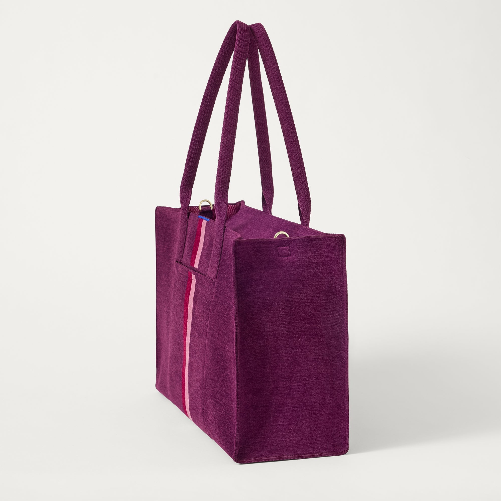 The Classic Tote in ReVelvet Orchid, shown from the side.