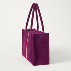 The Classic Tote in ReVelvet Orchid, shown from the side.