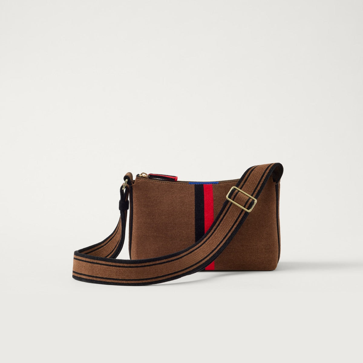 EXT  | The Casual Crossbody in ReVelvet Cinnamon Stripe shown from the front.