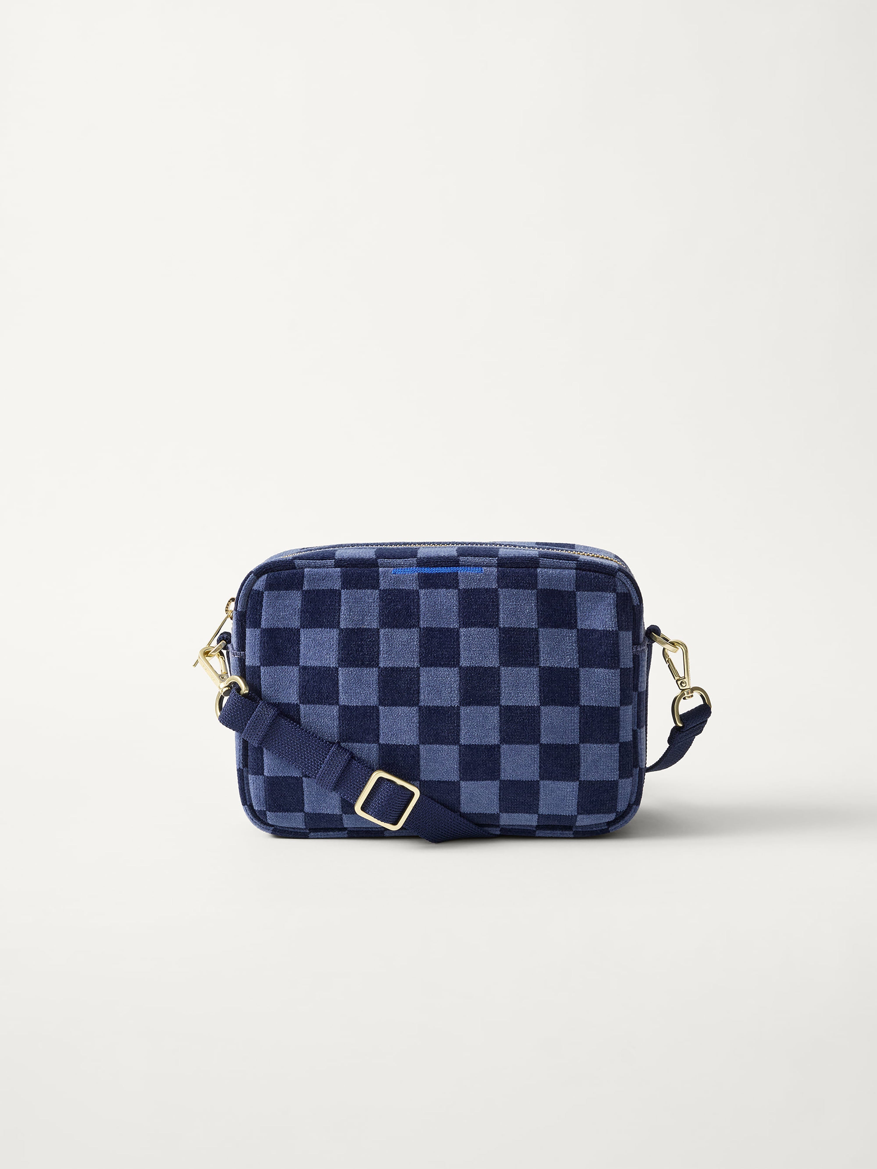 PLP | The Crossbody Camera Bag in  ReVelvet™ Blue Ink, shown from the front. 