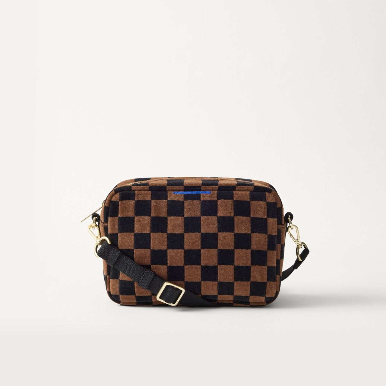 EXT | The Crossbody Camera Bag in  ReVelvet™ Umber Check, shown from the front. 