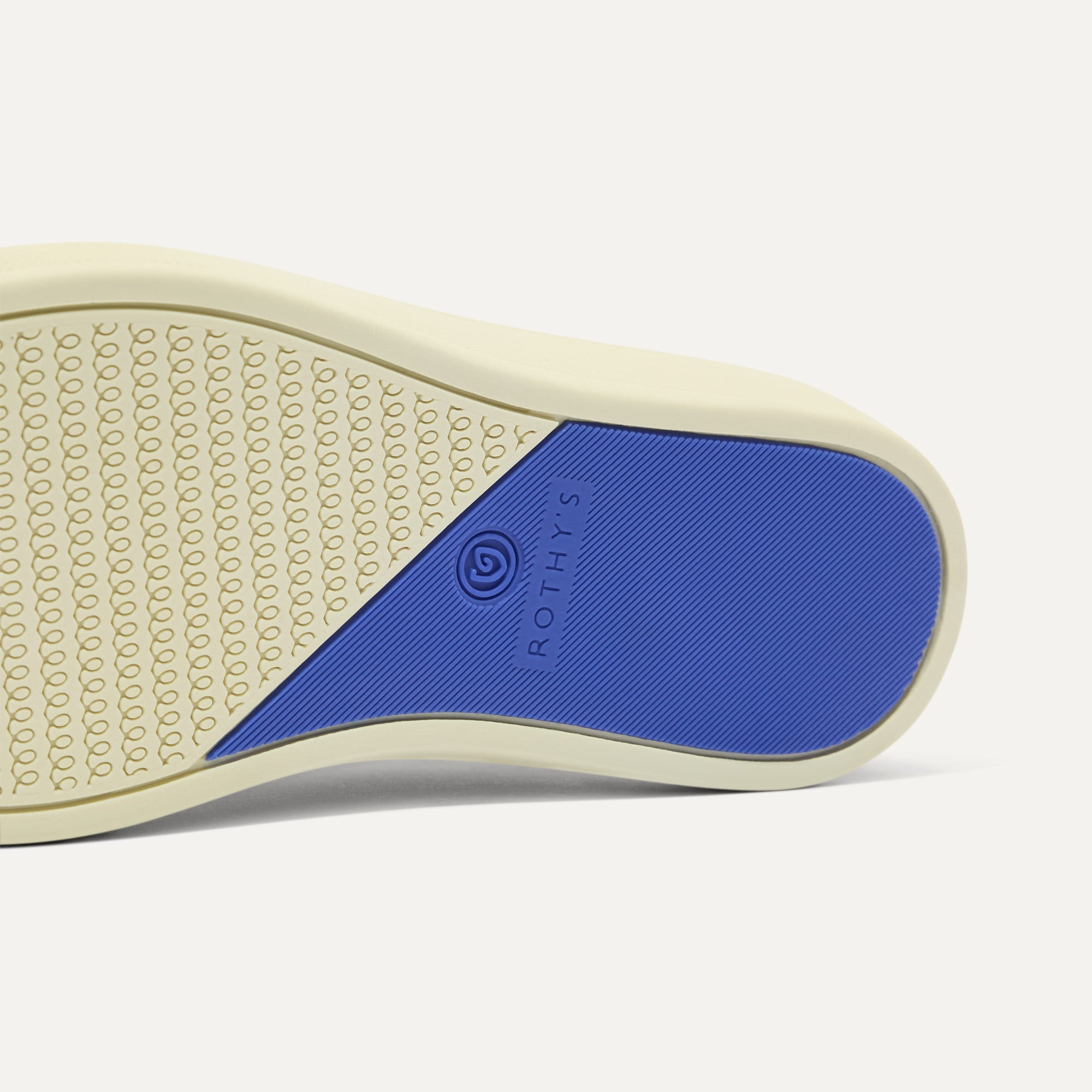 The sole of The Kids Strap Sneaker in Tutu Open-Knit.