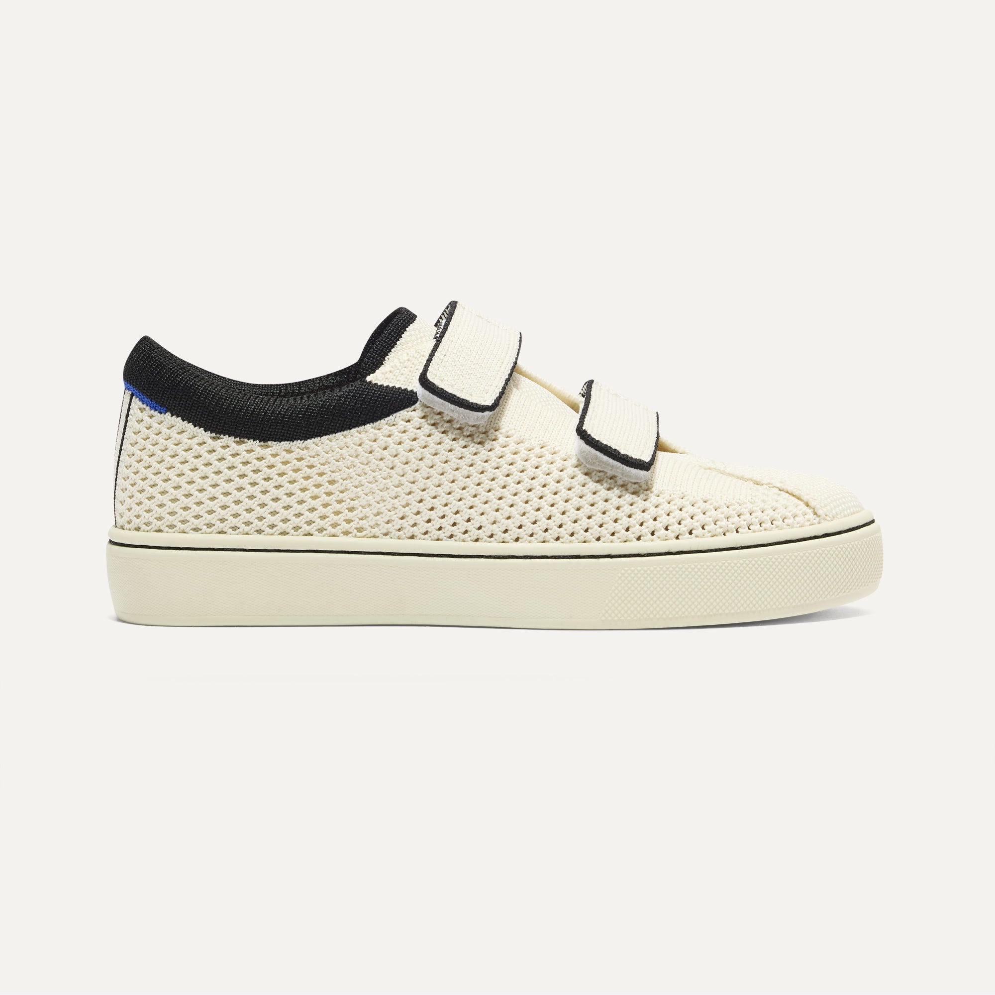 side | The Kids Strap Sneaker in Chess Open-Knit shown from the side. 