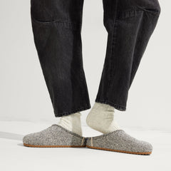 hover | Model wearing The Cozy Clog in Cookies and Cream Bouclé.