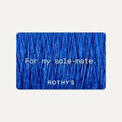 A gift card with blue thread behind white text that reads "For my sol-mate" and the Rothy's logo in white.