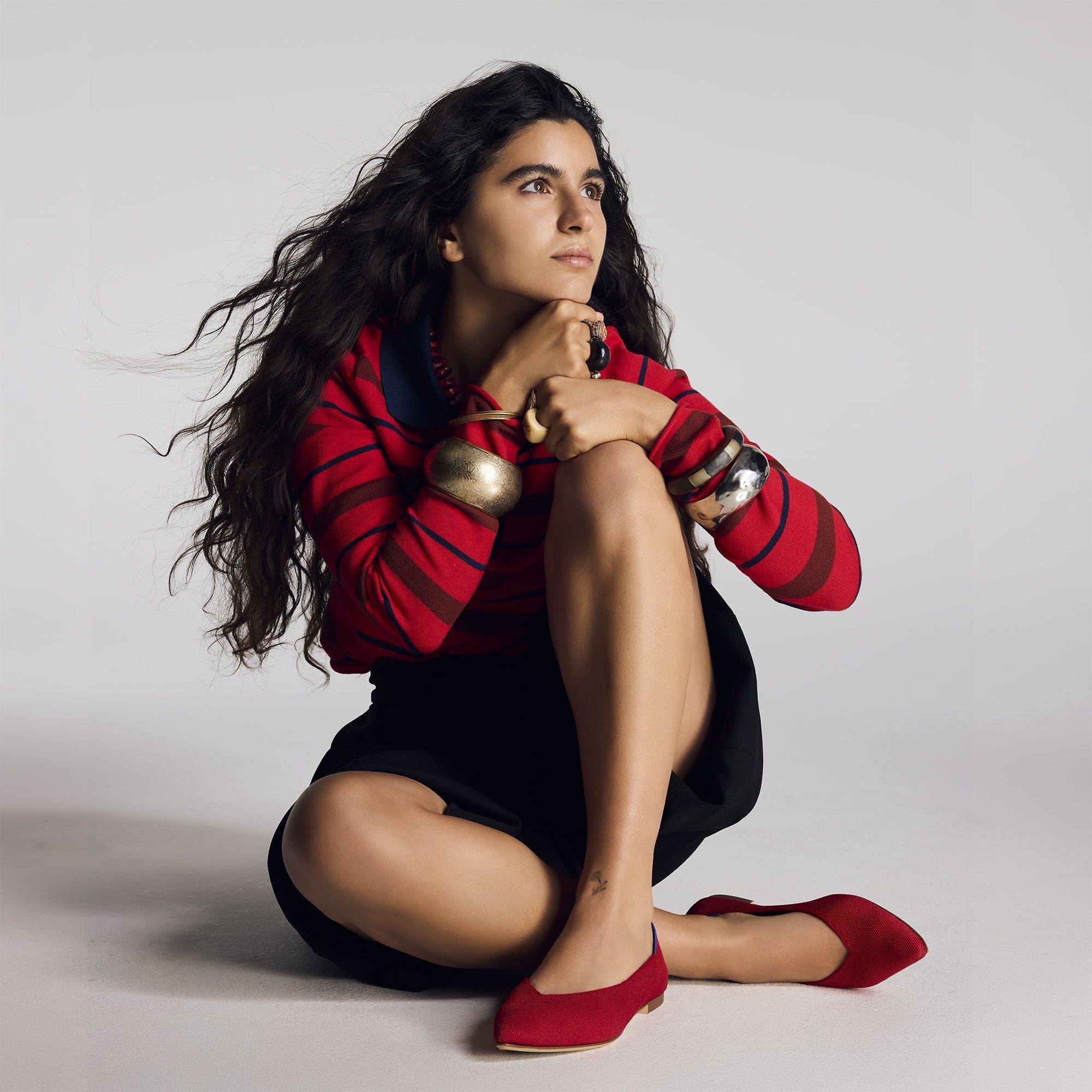 Overlay:: Teya Kepila wears The Point III in Cherry. | Alt: model | Alternate view of a model wearing The Point III in Cherry.